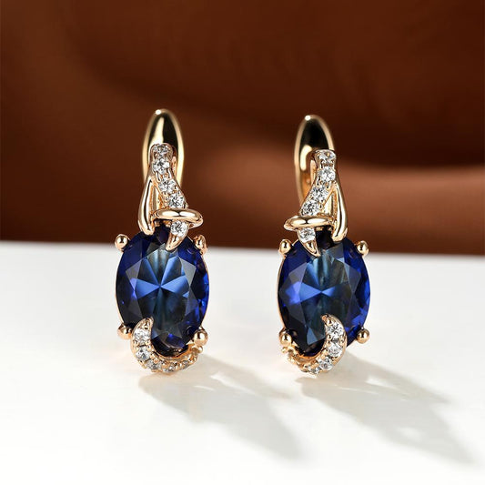 fachgo | [18K Gold Plated Earrings] 18K Gold Plated Blue Stone Stud Earrings | Trendy Round Oval Cut White Blue Red Pink Stone Drop Earrings | Anniversary Claw Earrings Jewelry for Women