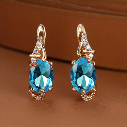fachgo | [18K Gold Plated Earrings] 18K Gold Plated Blue Stone Stud Earrings | Trendy Round Oval Cut White Blue Red Pink Stone Drop Earrings | Anniversary Claw Earrings Jewelry for Women
