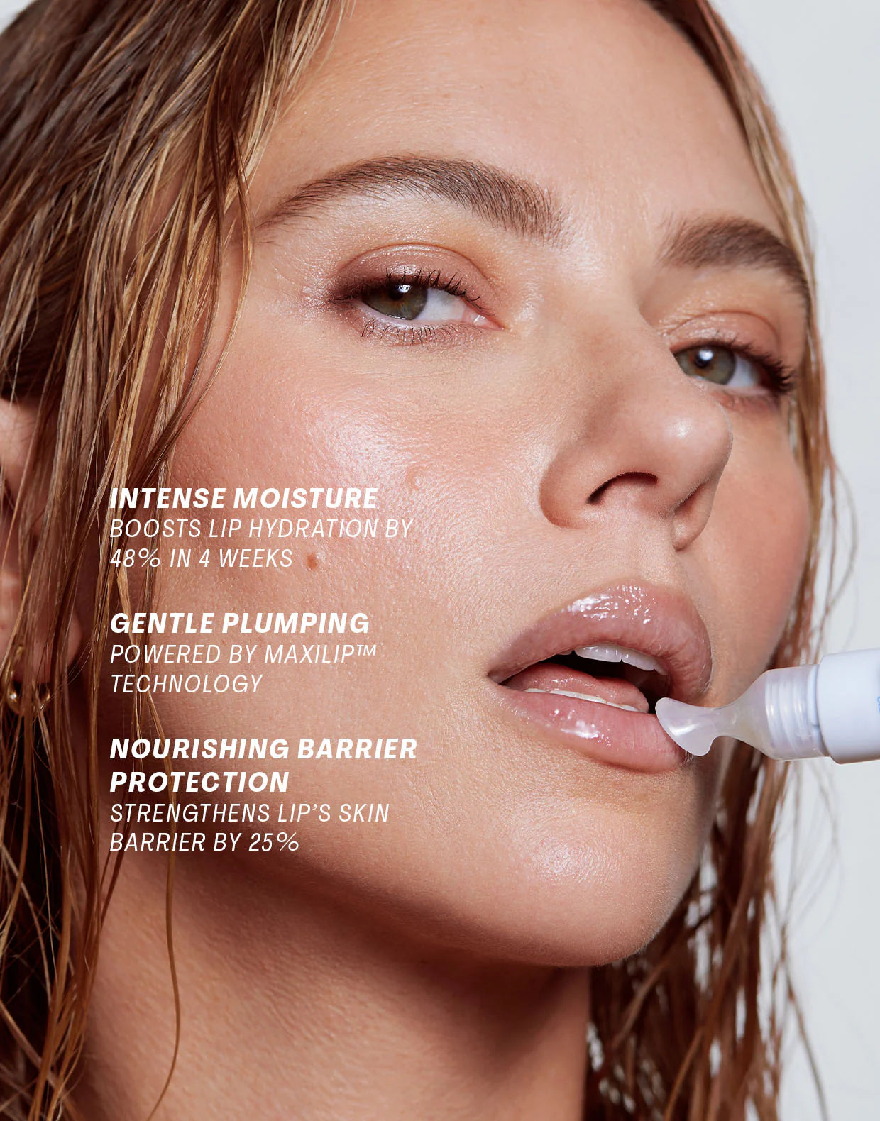 Close-up of model demonstrating the Glass Skin Duo lip treatment, showcasing intense hydration and plumping effects.