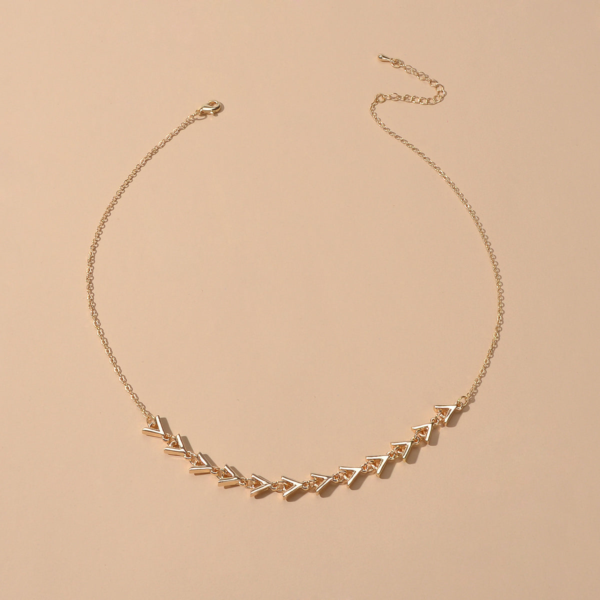 Gold Chain Arrow Charm Necklace with arrow-shaped charms, length 45.5cm.