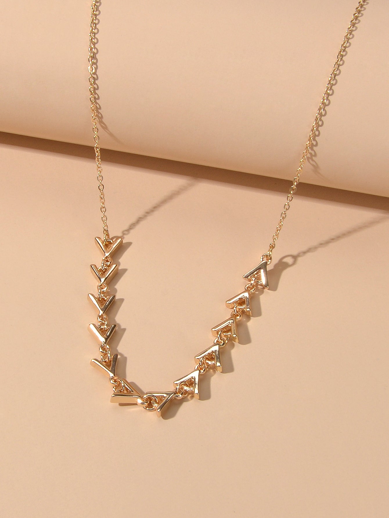 Gold Chain Arrow Charm Necklace with triangle arrow charms, length 45.5cm, elegantly designed.