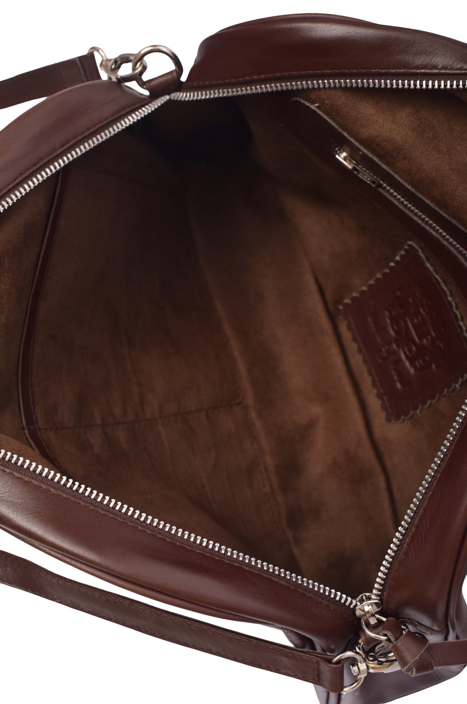 Interior view of Sabine Leather Handbag showcasing its spacious design and high-quality lining.