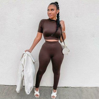 2 Piece Set Long Sleeve Solid Crop Top and Leggings model wearing brown outfit posing outdoors