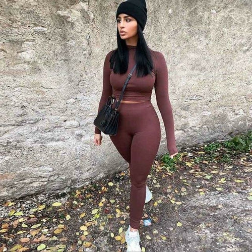 2 Piece Set Long Sleeve Solid Crop Top and Leggings worn with black hat and bag, styled for winter streetwear.