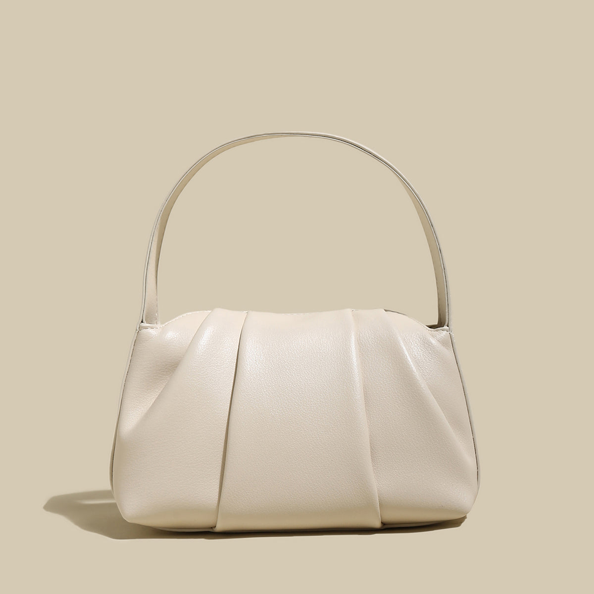 Ruched Leather Handbag featuring elegant pleats and a spacious compartment for everyday essentials.